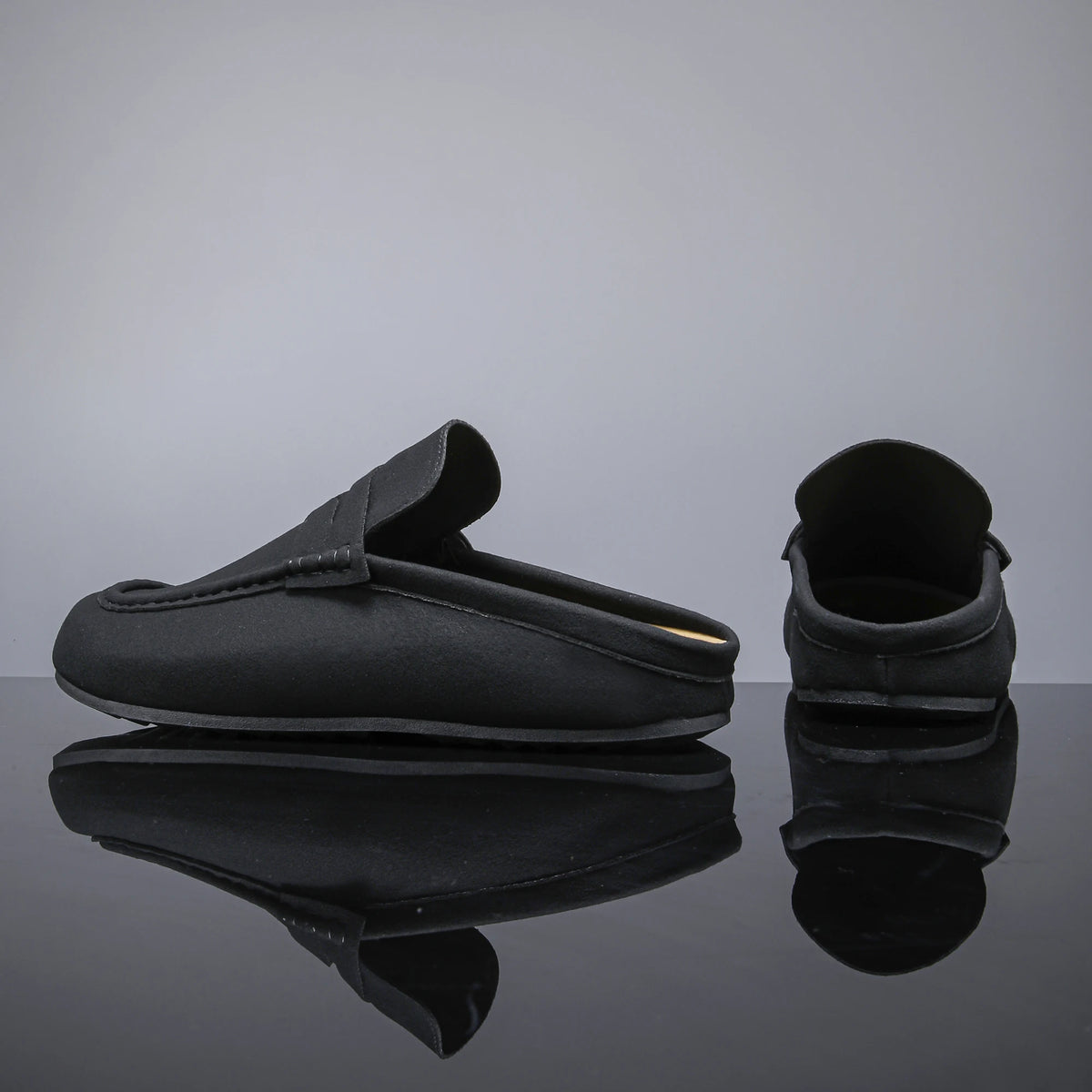 Denman Napped Mules penny strap detail