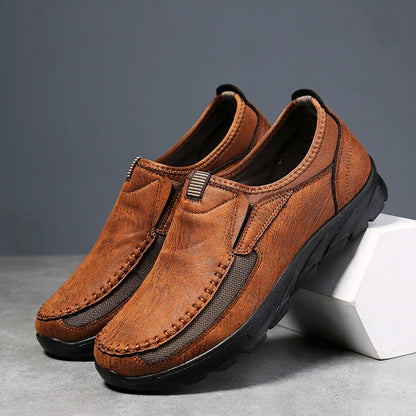 Whitlock Vented Moccasins in light brown, side profile showing mesh panel
